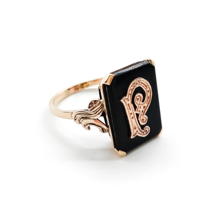 Charming 9ct rose gold and onyx signet ring with a fancy script letter “P”. Circa 1930’s