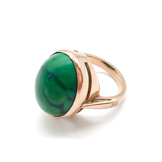 Stylish 9ct rose gold ring set with a beautiful oval cabochon green turquoise stone.