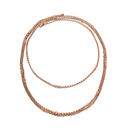 Lovely 9ct Rose Gold Victorian-style ornate link long guard chain with a dog-clip. Can be draped around the neck three times.