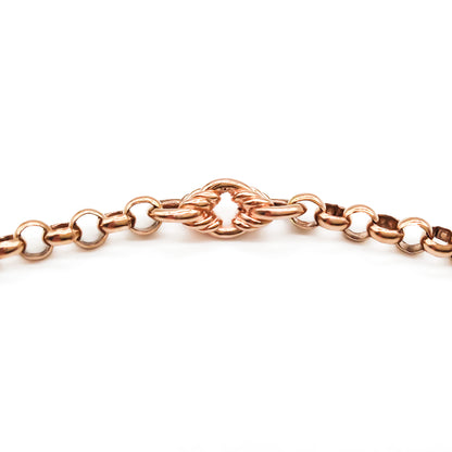 Lovely 9ct Rose Gold Victorian-style ornate link long guard chain with a dog-clip. Can be draped around the neck three times.