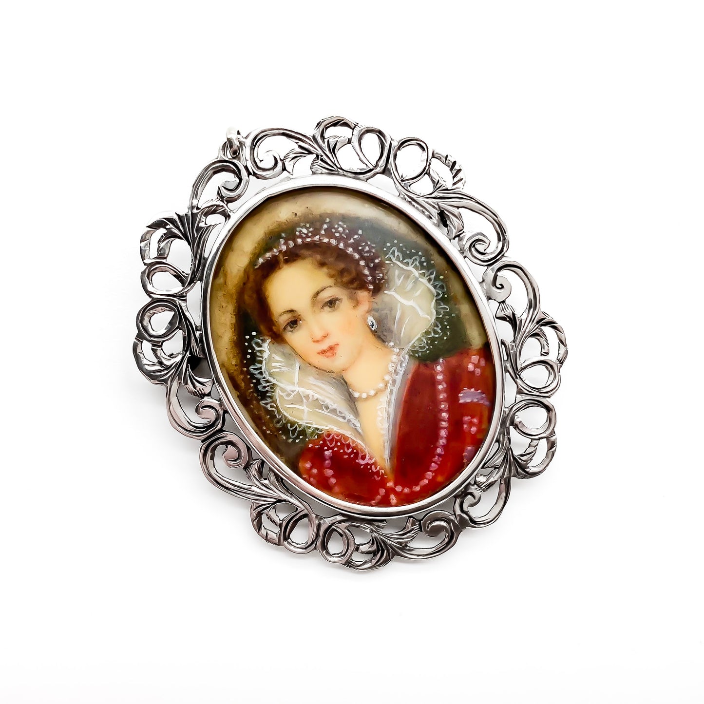 Beautiful antique European hand painted miniature set in an intricate silver (900) frame. Can be worn as a pendant or a brooch.