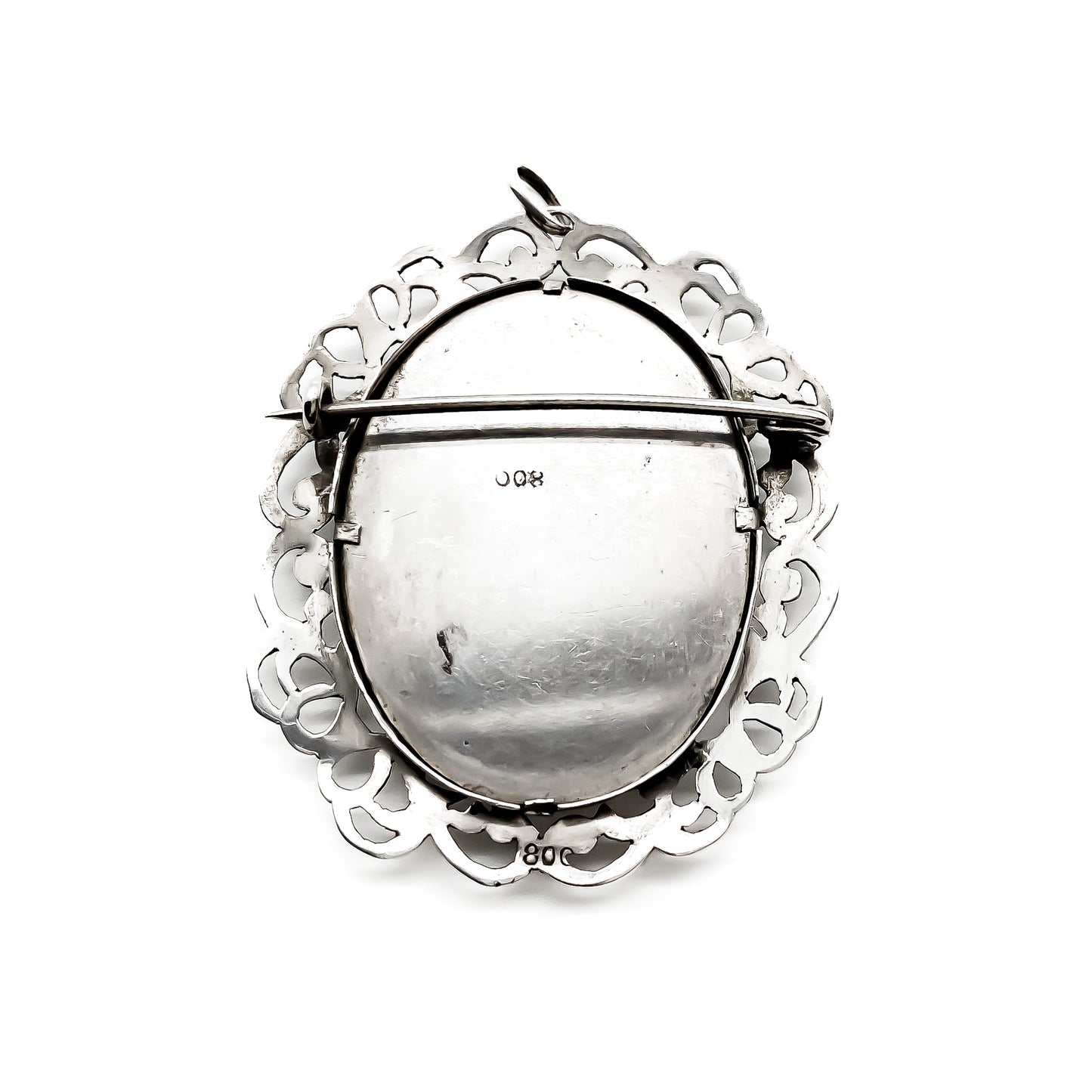 Beautiful antique European hand painted miniature set in an intricate silver (900) frame. Can be worn as a pendant or a brooch.