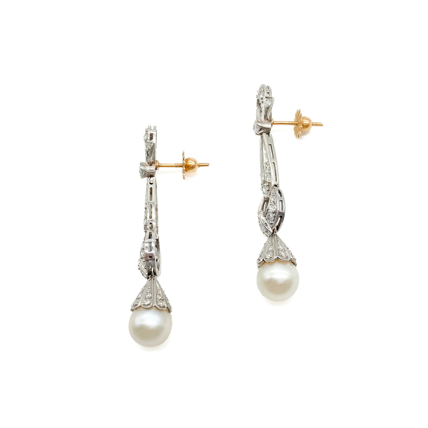 Stunning Art Deco 18ct white gold articulated drop earrings, each set with a 0.10ct diamond, thirty-three pavé set diamonds and a lustrous pearl. 18ct Rose gold pin and butterfly. Argentina