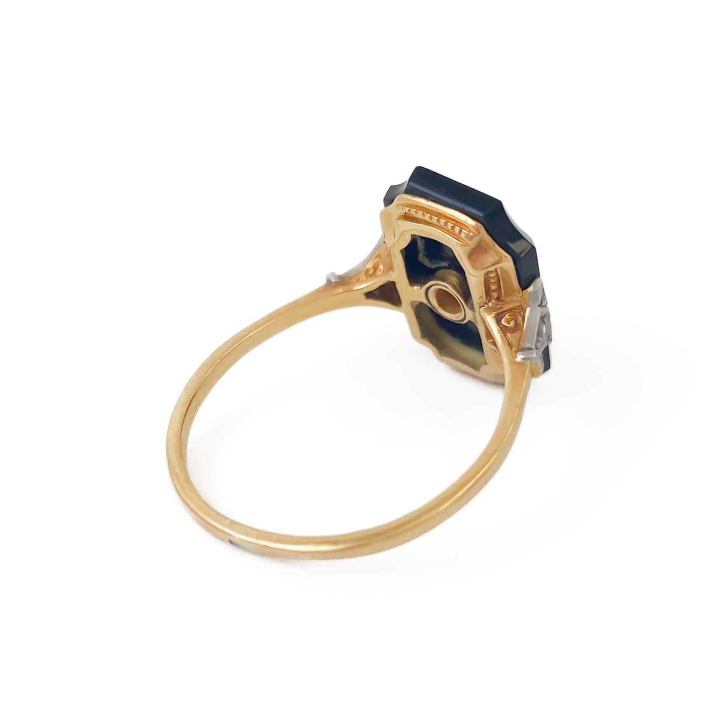 Stylish 18ct gold Art Deco onyx ring set with a single seed pearl and a mine cut diamond on each shoulder.