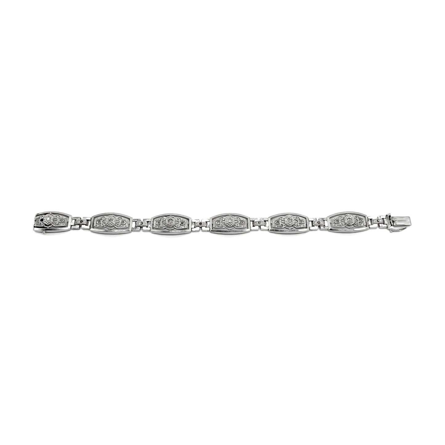 Stunning Art Deco 18ct white gold articulated bracelet set with six European-cut diamonds (0.05ct each) and eighteen tiny mine cut diamonds. Argentina