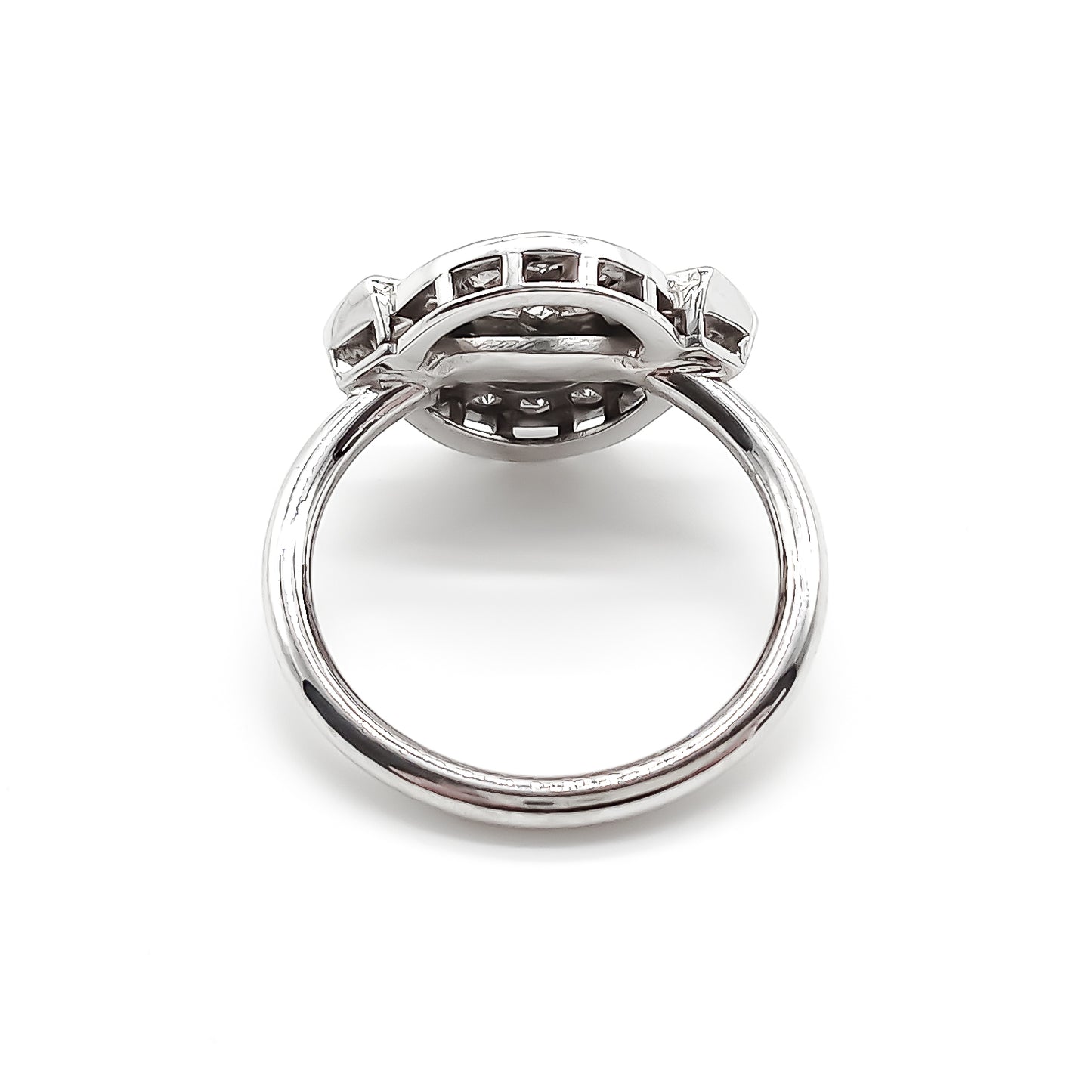 Stunning 18ct white gold Art Deco ring with a princess cut centre diamond and fourteen round cut diamonds.