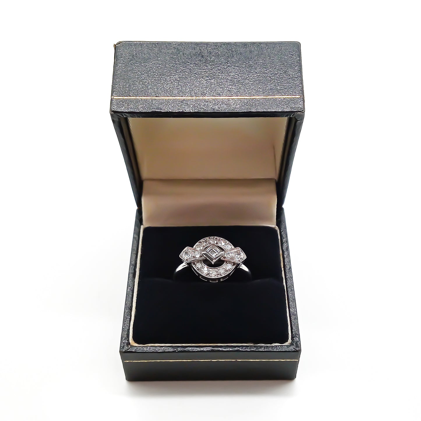 Stunning 18ct white gold Art Deco ring with a princess cut centre diamond and fourteen round cut diamonds.