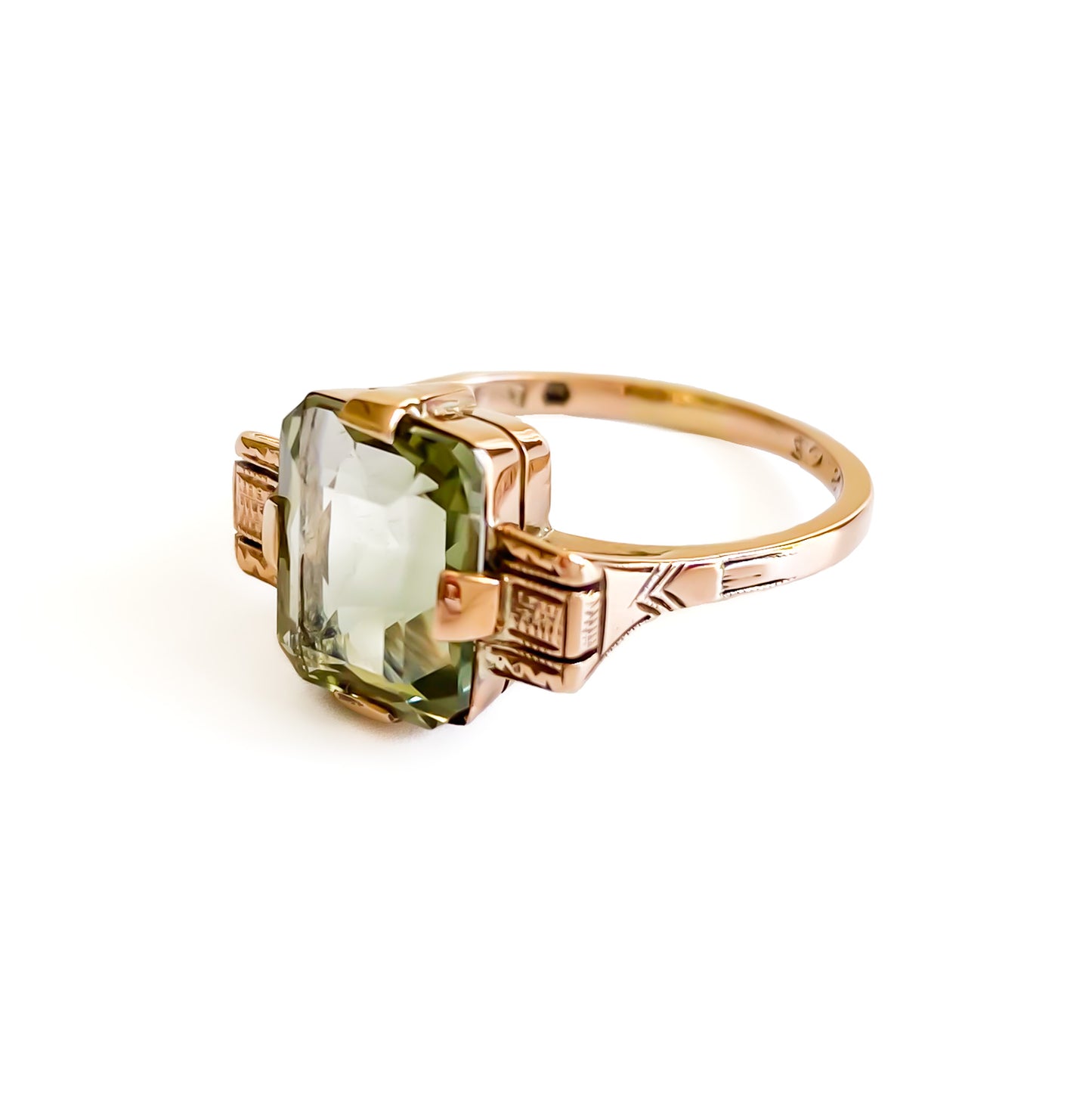 Art Deco 9ct rose gold ring set with a beautifully faceted green rectangular prasiolite gemstone.