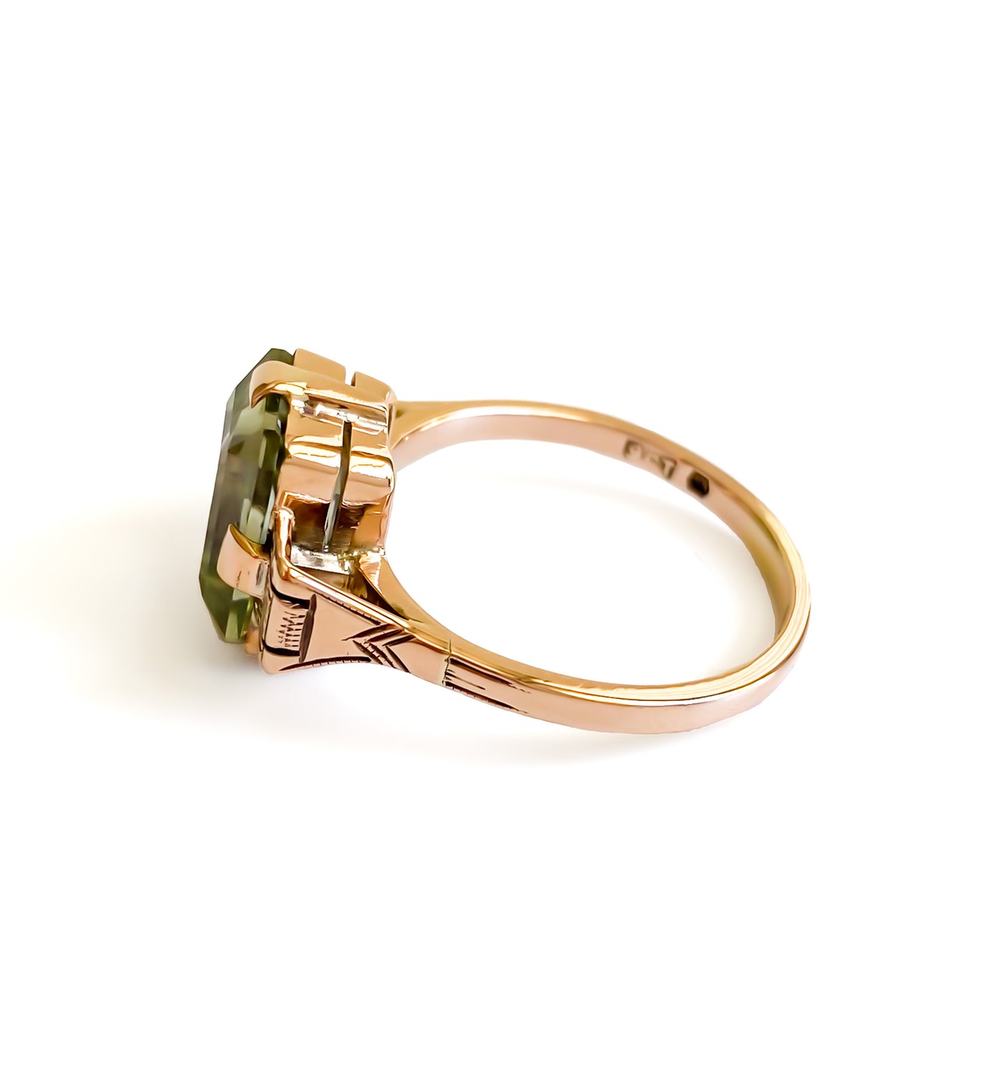 Art Deco 9ct rose gold ring set with a beautifully faceted green rectangular prasiolite gemstone.