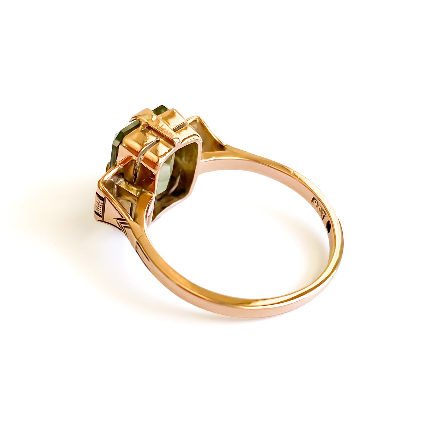 Art Deco 9ct rose gold ring set with a beautifully faceted green rectangular prasiolite gemstone.