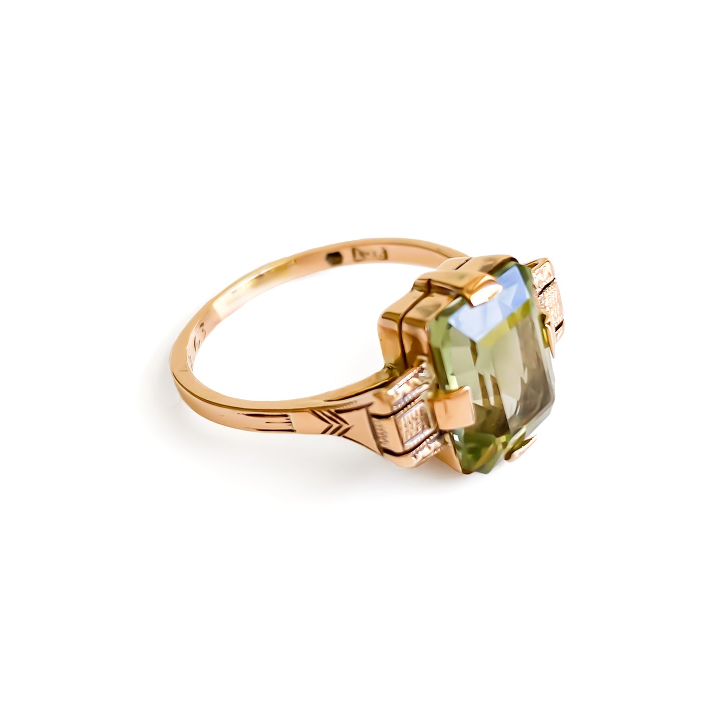 Art Deco 9ct rose gold ring set with a beautifully faceted green rectangular prasiolite gemstone.