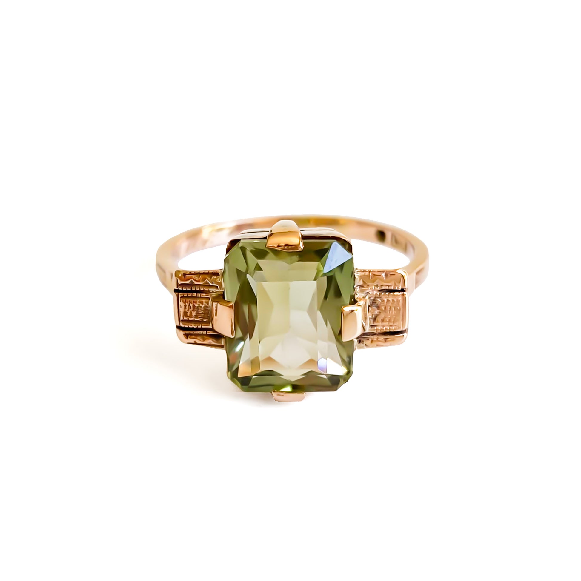 Art Deco 9ct rose gold ring set with a beautifully faceted green rectangular prasiolite gemstone.