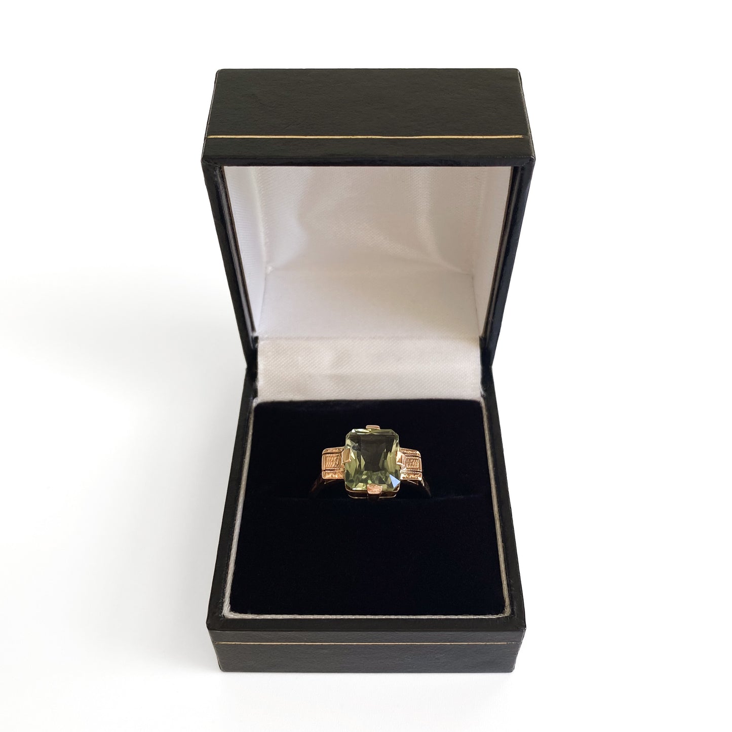 Art Deco 9ct rose gold ring set with a beautifully faceted green rectangular prasiolite gemstone.