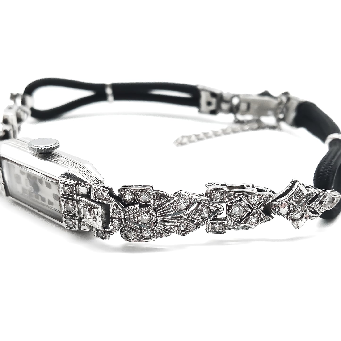 Glamorous Art Deco platinum ladies wrist watch set with forty-eight old-cut diamonds. Watch has been serviced and is in good working condition. Adjustable strap.