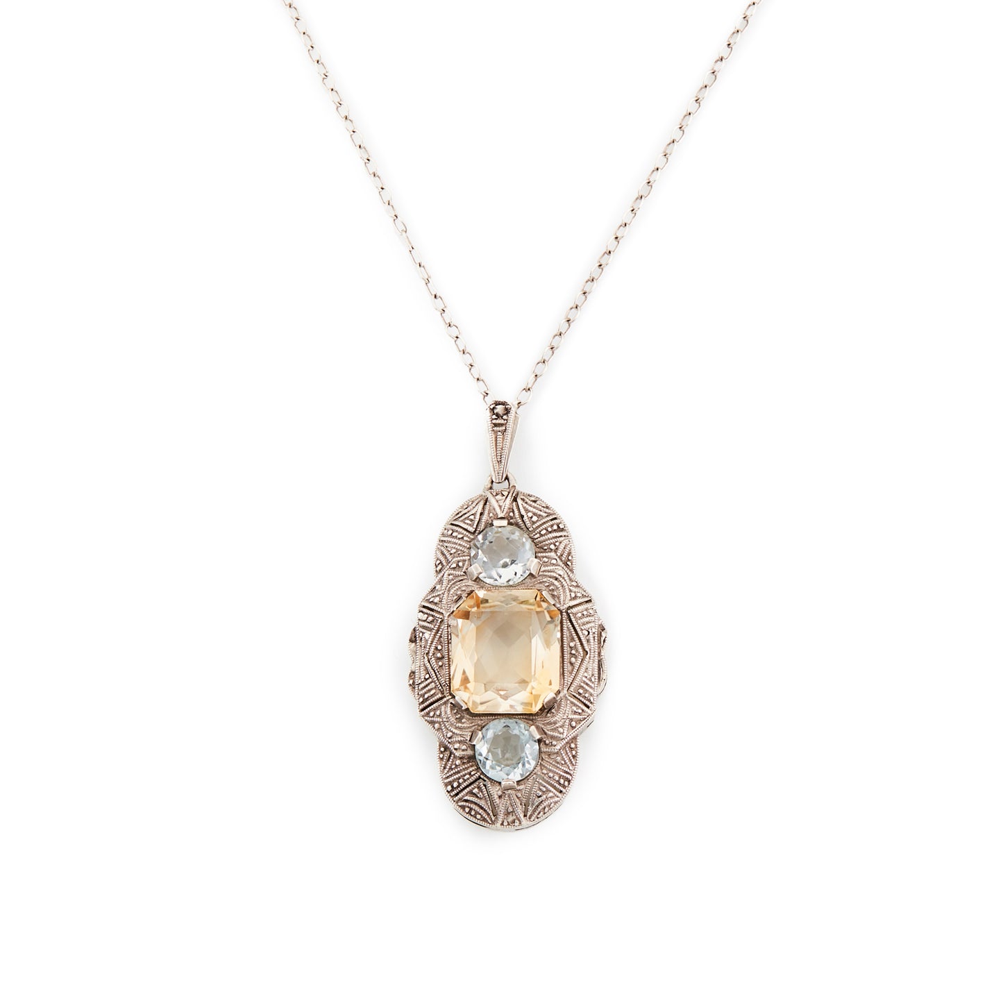 Lovely silver Art Deco Fahner-style pendant set with a single citrine and two faceted aquamarines, on a silver chain.
