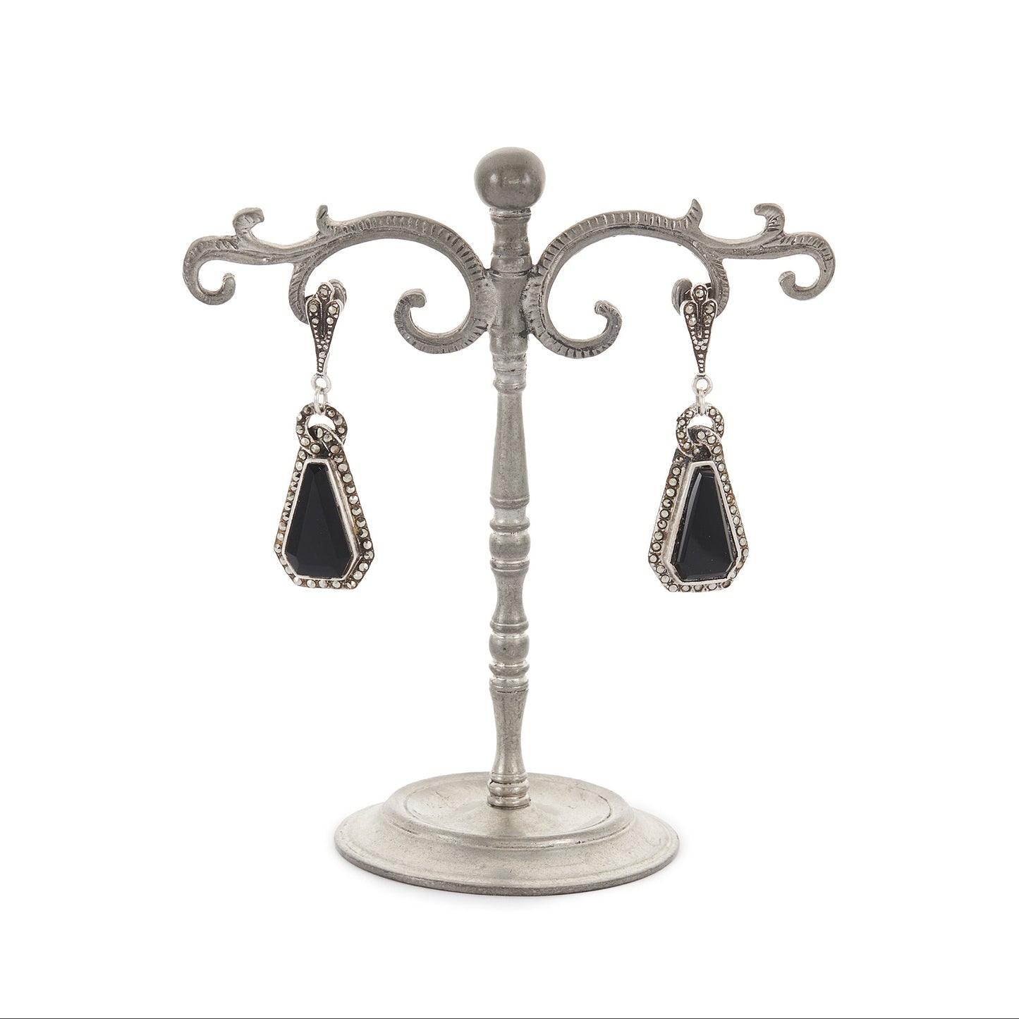 Sterling silver Art Deco marcasite earrings, each set with a faceted onyx stone, surrounded by marcasites.