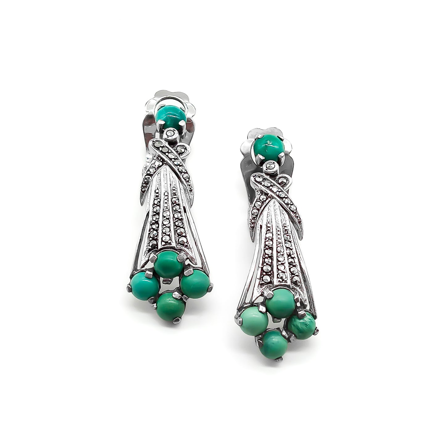 Glamorous Art Deco clip-on drop earrings set with cabochon turquoise stones and marcasites. Circa 1930’s
