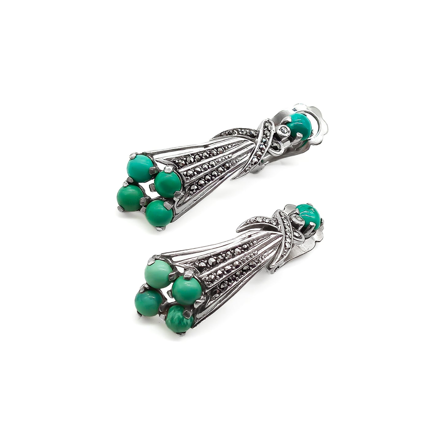 Glamorous Art Deco clip-on drop earrings set with cabochon turquoise stones and marcasites. Circa 1930’s