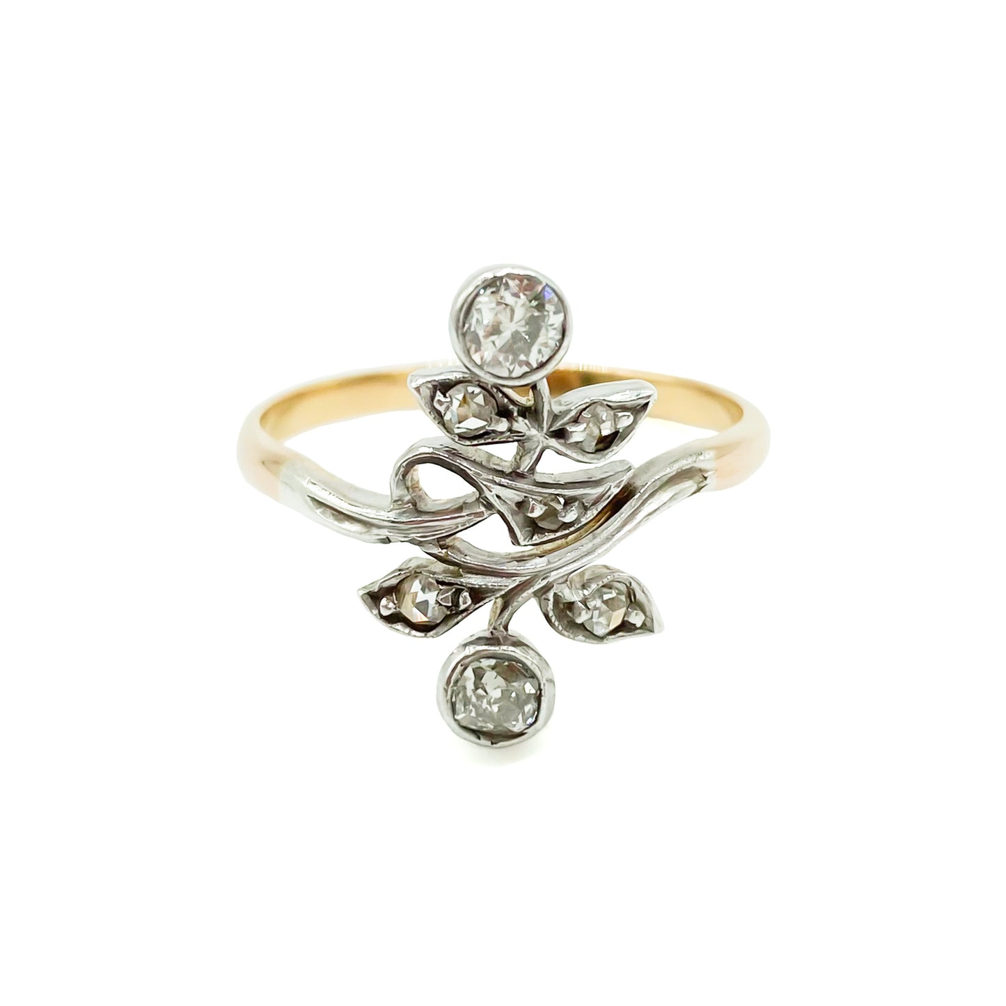 Gorgeous Art Nouveau ring set with seven old-cut diamonds in a floral design. Argentina