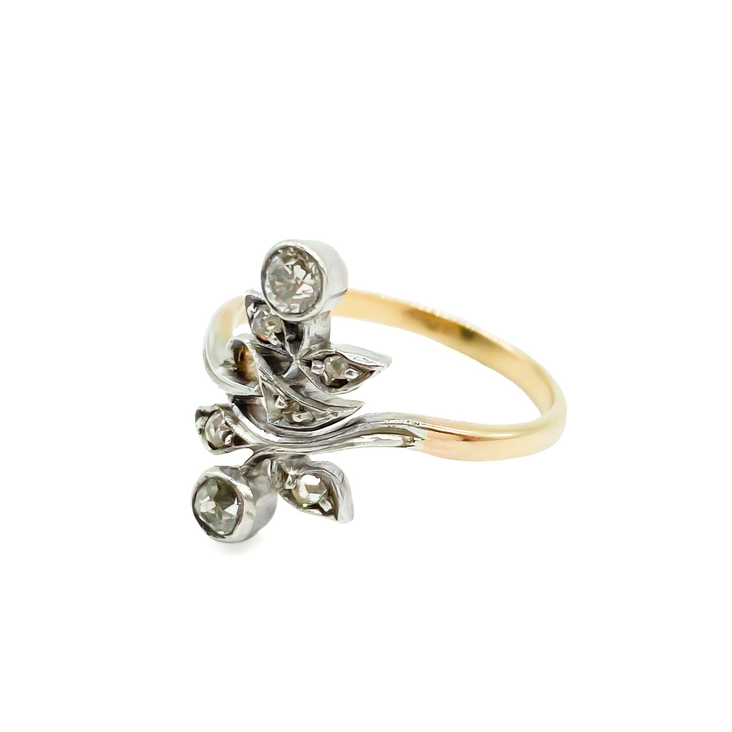 Gorgeous Art Nouveau ring set with seven old-cut diamonds in a floral design. Argentina