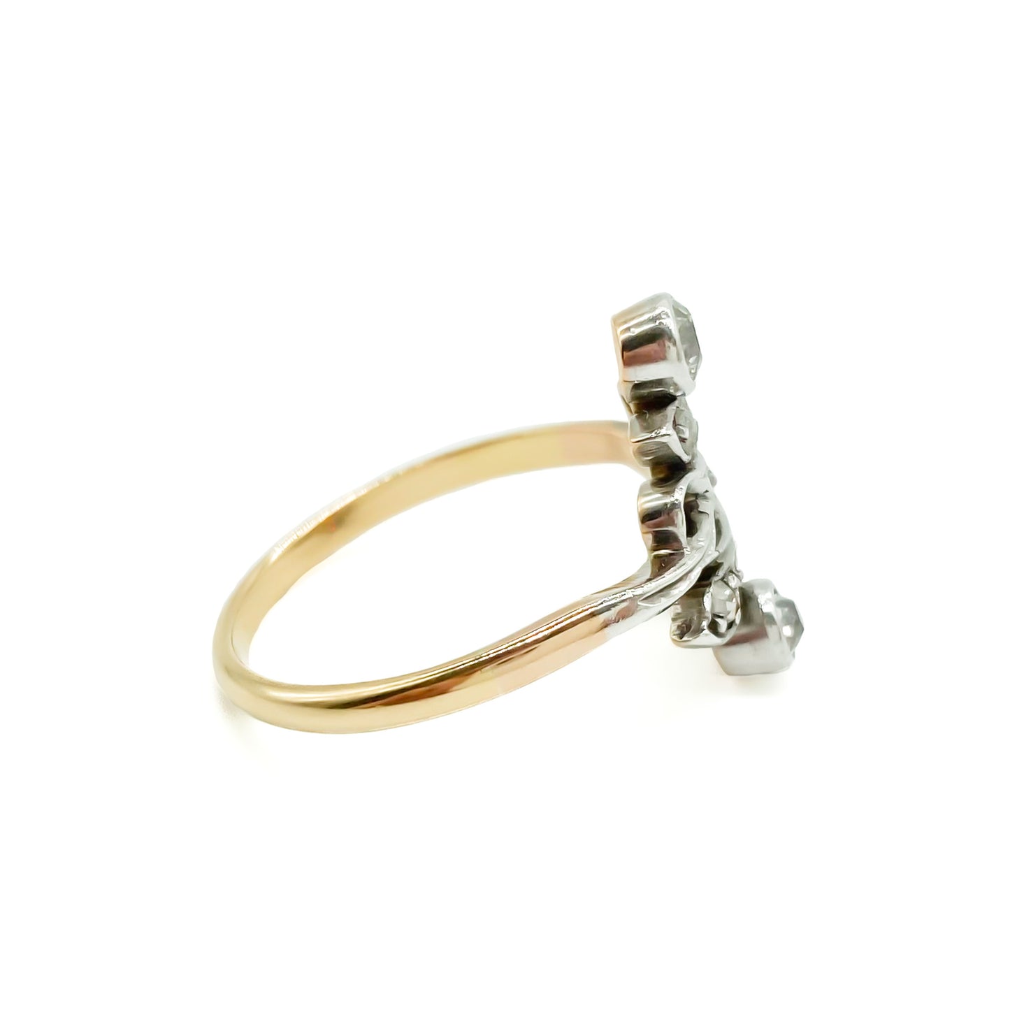 Gorgeous Art Nouveau ring set with seven old-cut diamonds in a floral design. Argentina