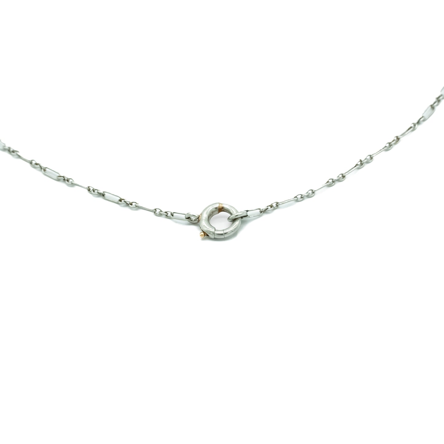 Exquisite silver Art Nouveau pendant set with a luminescent oval moonstone on a delicate fancy link chain.