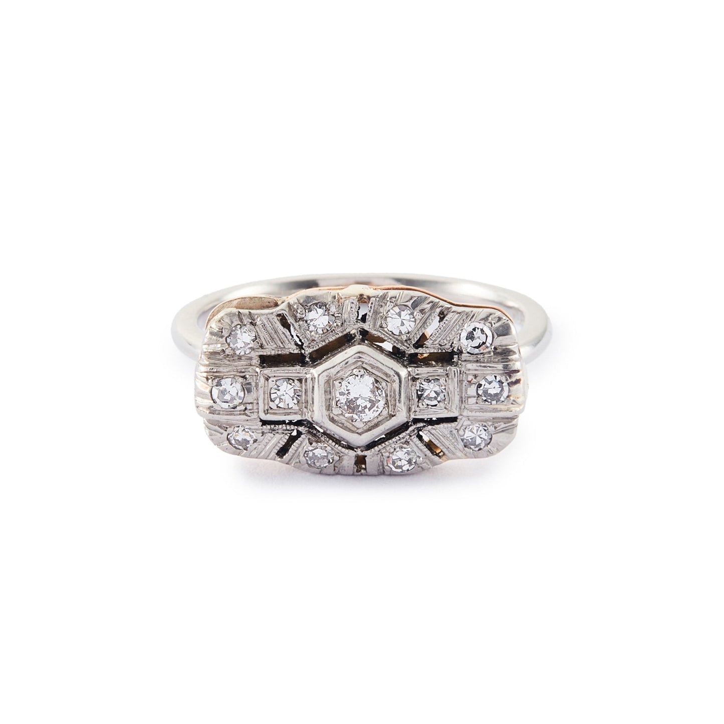 Beautiful Art Deco platinum and 18ct rose gold ring set with thirteen old-cut diamonds in an ornate setting.