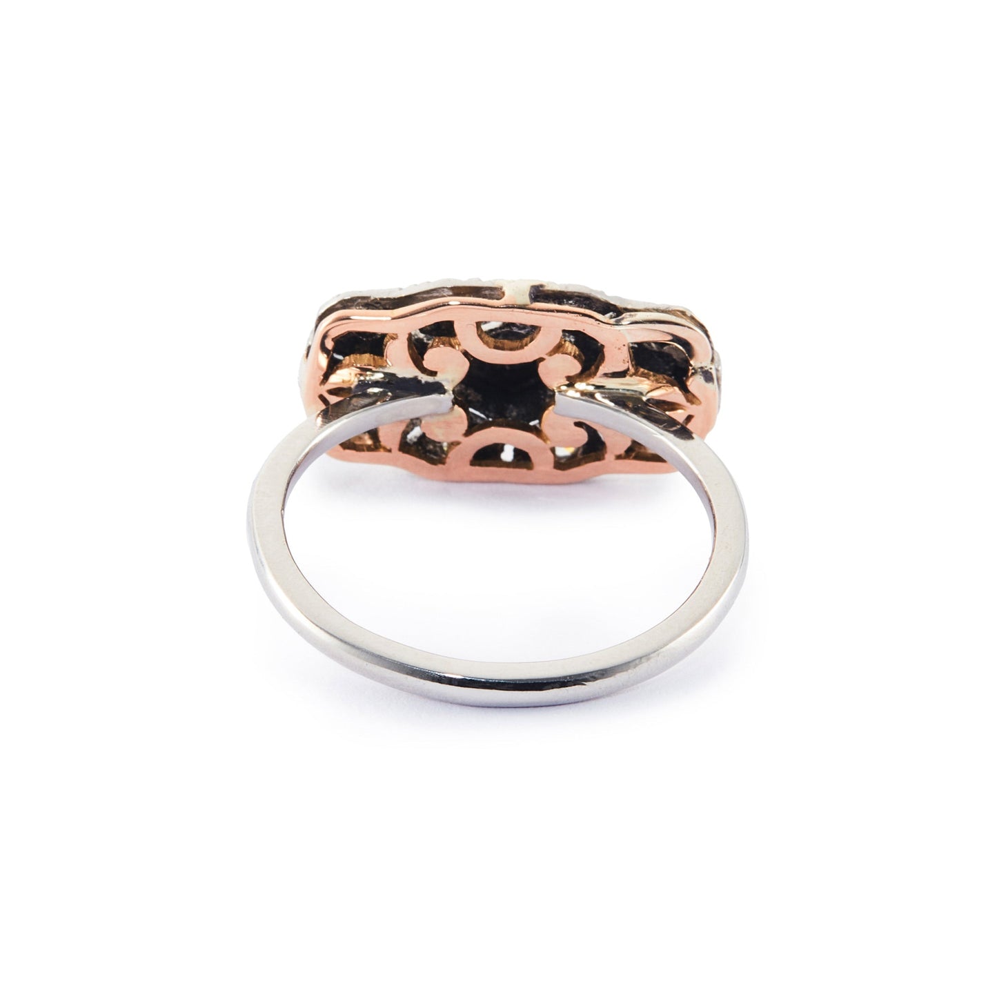 Beautiful Art Deco platinum and 18ct rose gold ring set with thirteen old-cut diamonds in an ornate setting.