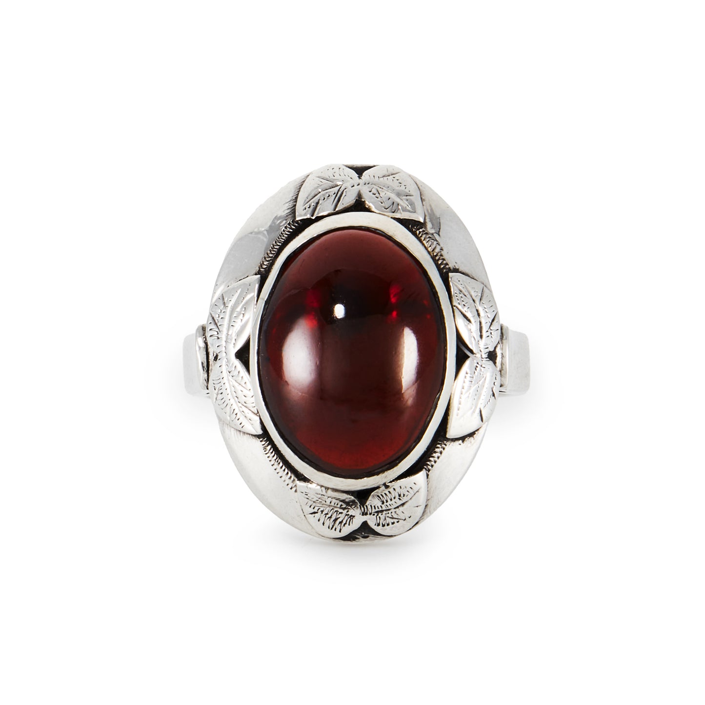 Lovely silver Arts and Crafts ring, set with a deep red oval cabochon garnet in an engraved leaf setting.