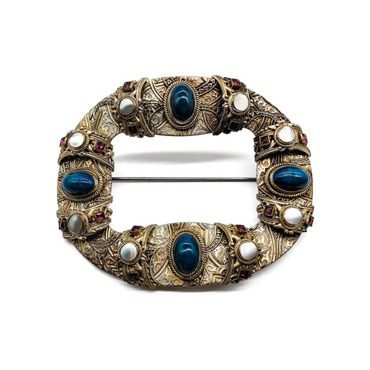 Large beautifully engraved Arts and Crafts silver gilt brooch set with lapis lazuli, mother of pearl and garnet stones.
