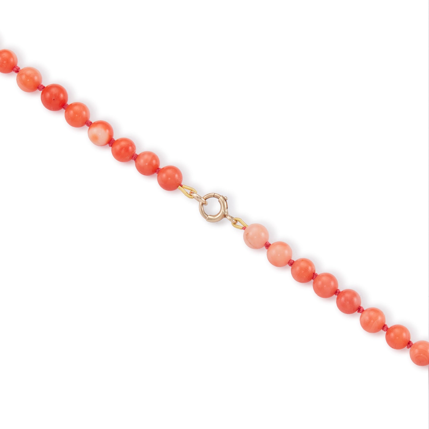 Lovely string of angel hair coral with interesting range in colour and size of the beads, with a 9ct gold clasp. Can be draped twice around the neck to form a choker.
