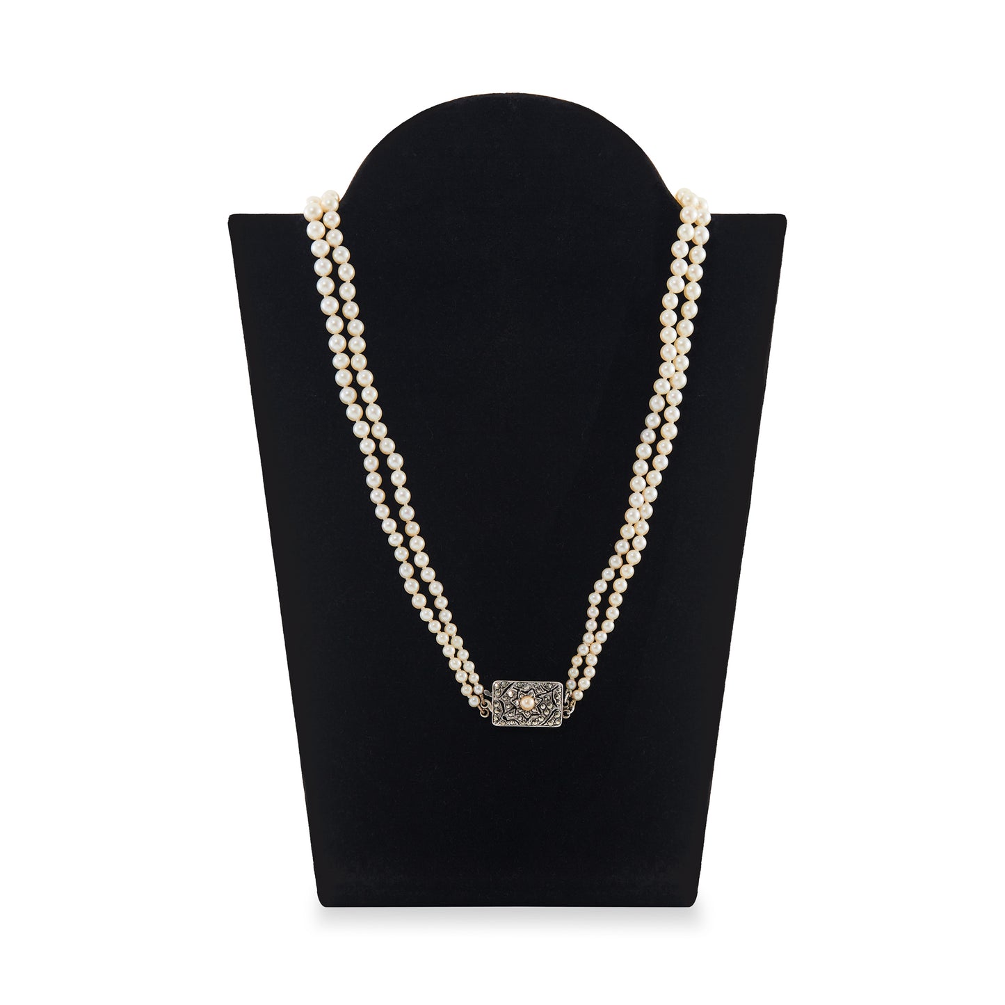 Beautiful pearl necklace consisting of two strands of creamy graduated seawater pearls, finished with a stunning vintage sterling silver, marcasite and seed pearl clasp. The pearls have a lovely lustre.