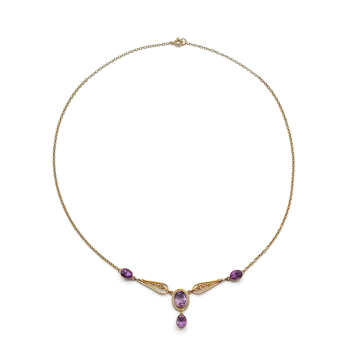 Gorgeous 15ct gold Edwardian necklace set with four beautifully faceted oval amethysts and eight small seed pearls.