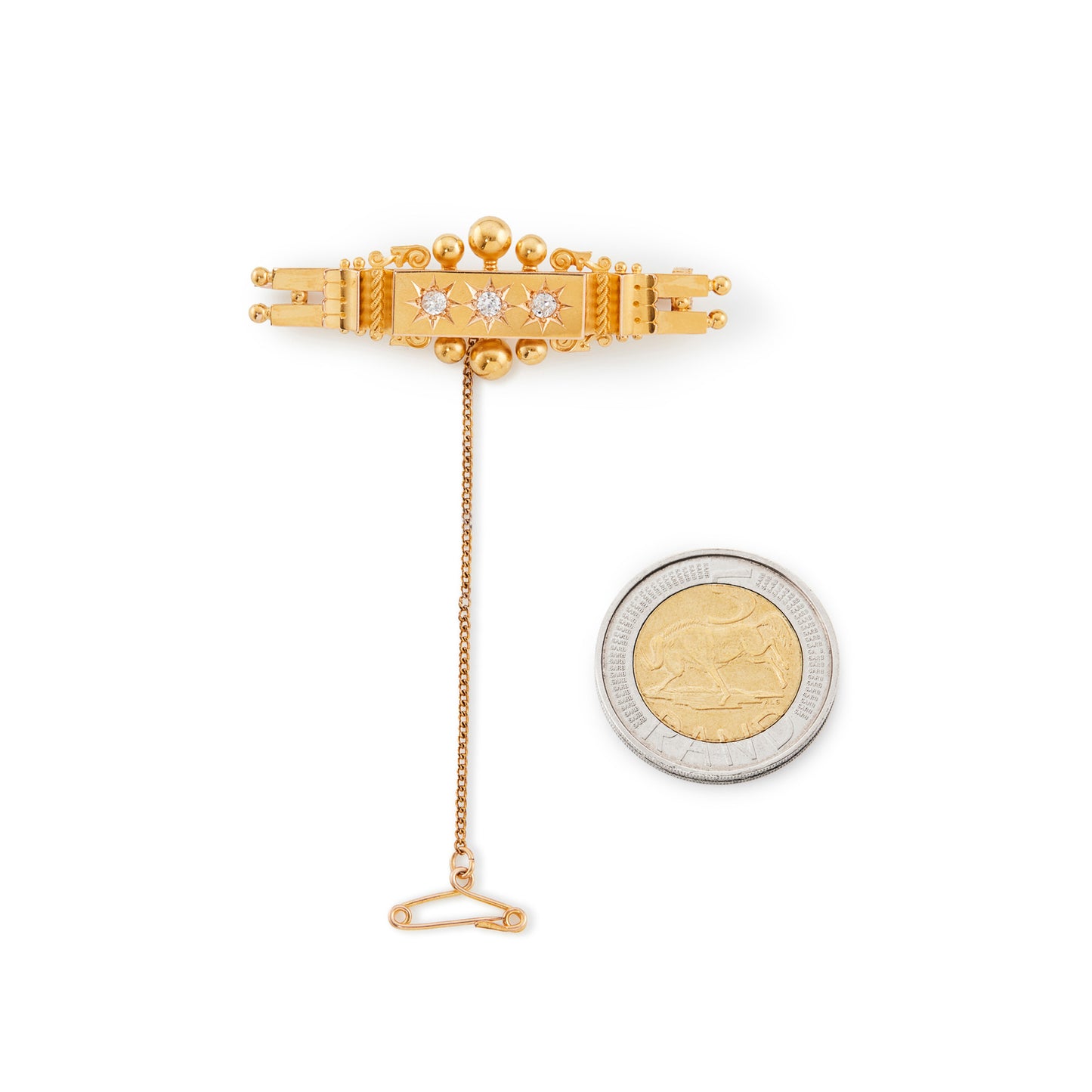 Exquisite 15ct gold bar brooch with three old-cut diamonds, each in a star setting. Safety chain attached. Chester 1902