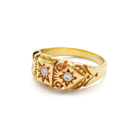 Classic Edwardian 18ct yellow gold trilogy diamond ring with beautiful engraving.