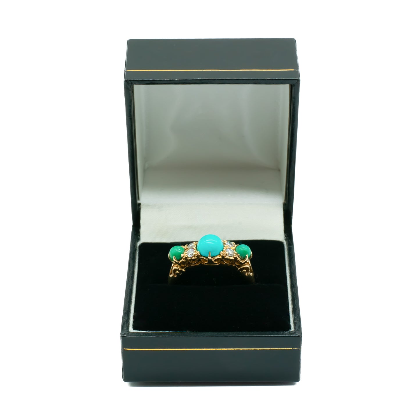 Beautiful Edwardian 9ct gold ring set with three cabochon turquoise stones and four faceted diamonds.