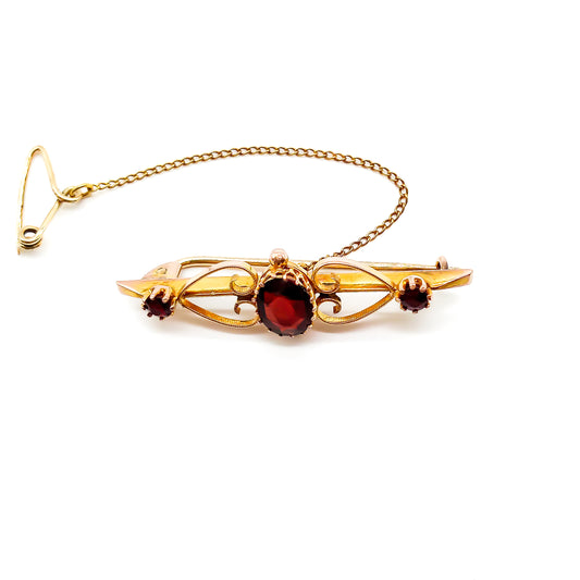 Lovely Edwardian 9ct gold bar brooch set with three beautifully faceted garnets. Chester 1908