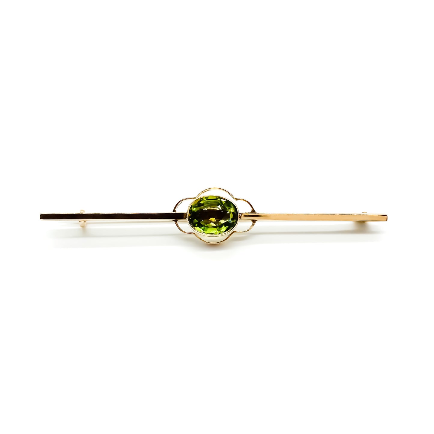 Pretty 9ct rose gold Edwardian bar brooch set with a beautiful oval peridot.