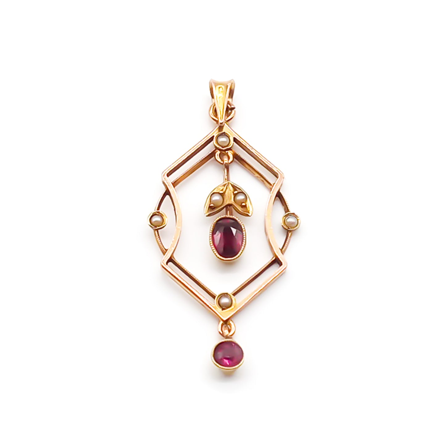 Dainty Edwardian 9ct rose gold pendant set with six seed pearls and two faceted garnet drops.