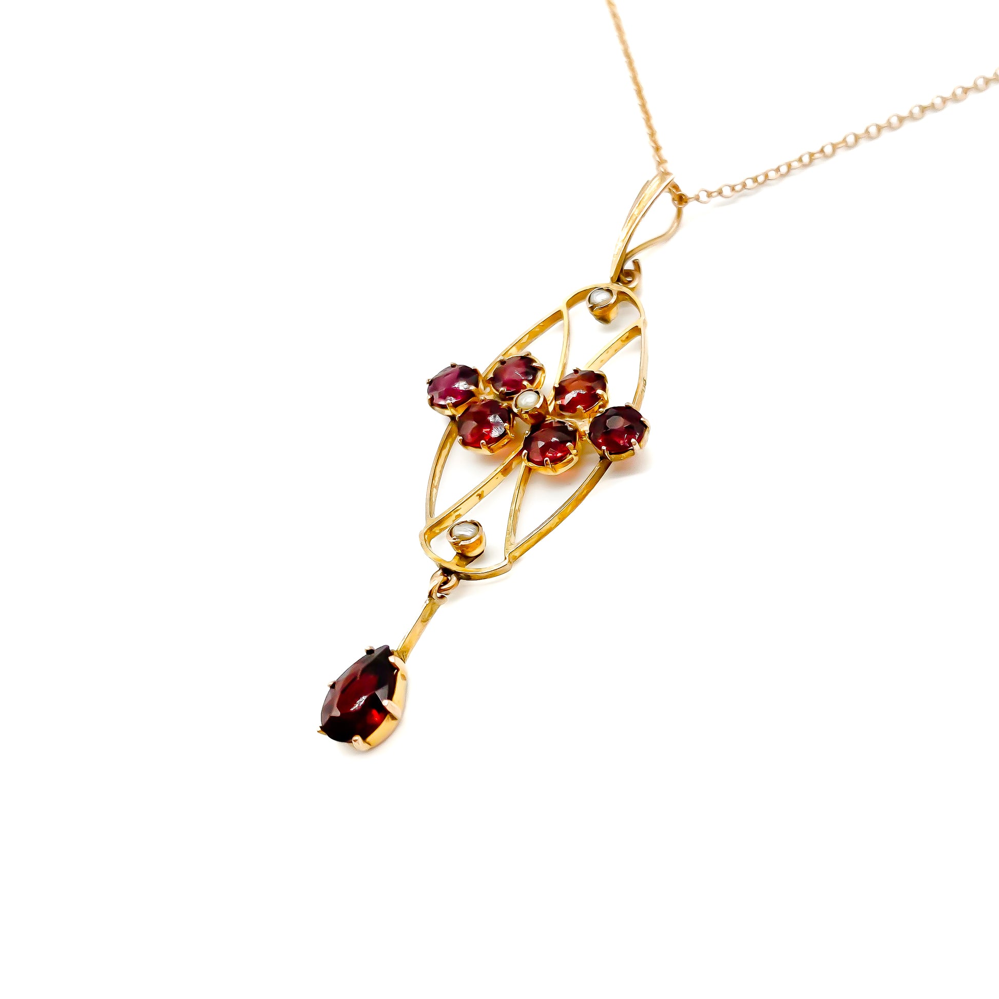 Delicate Edwardian 9ct rose gold garnet and seed pearl pendant on a 9ct rose gold chain.