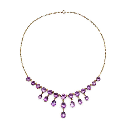 Stunning Edwardian gold plated on silver festoon necklace set with twenty-one beautifully faceted amethysts.