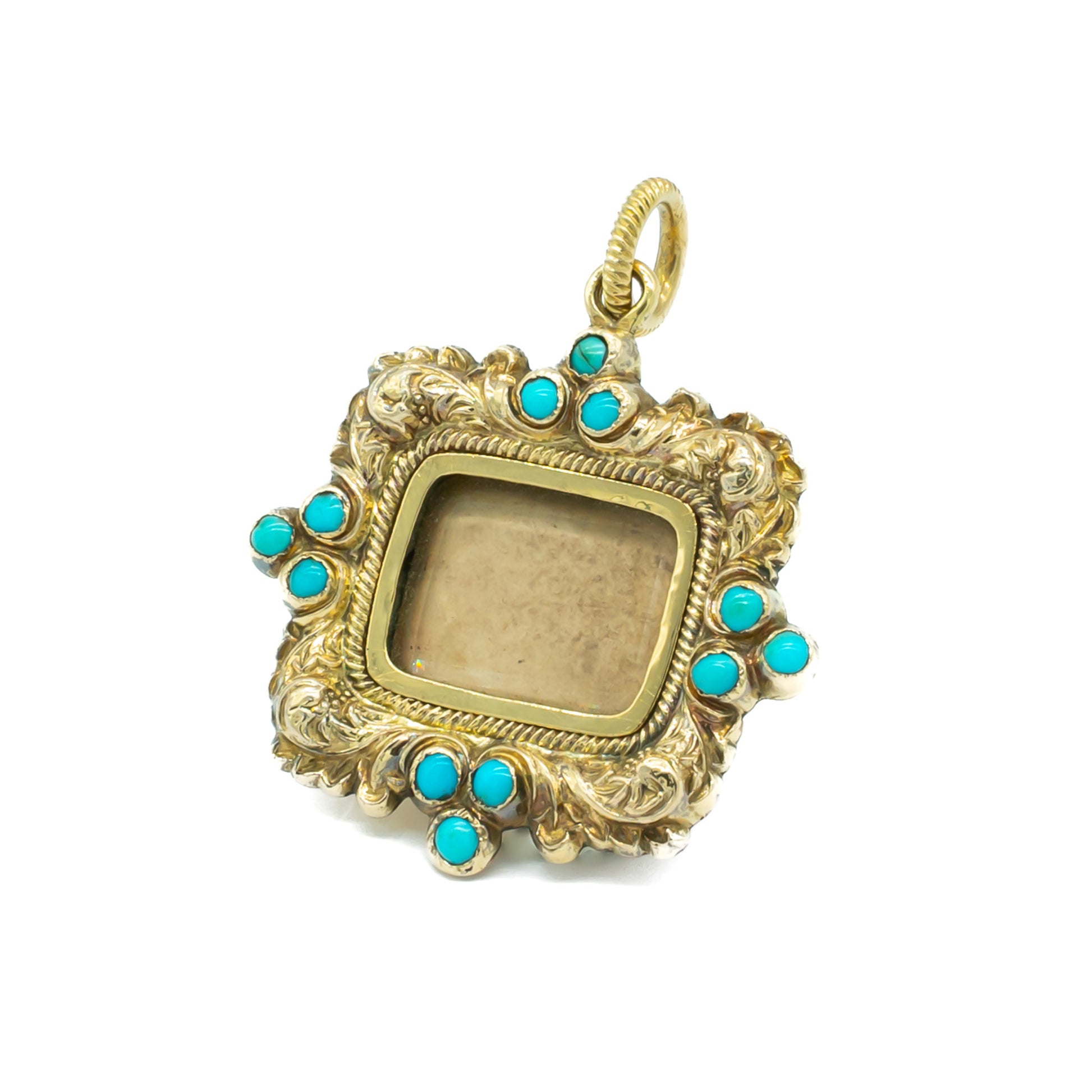 Exquisite Georgian 9ct gold cased mourning pendant set with 12 small round turquoise stones. Rectangular piece of glass in centre - ideal for photo.
