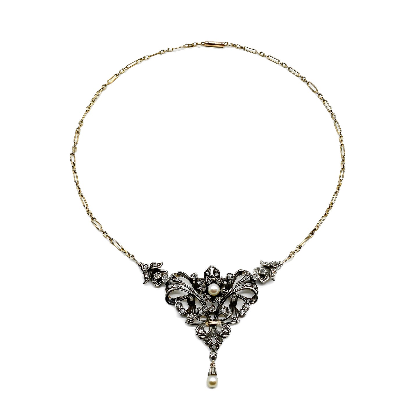 Gorgeous Edwardian gold and silver necklace set with old-cut diamonds and two pearls. Circa 1910