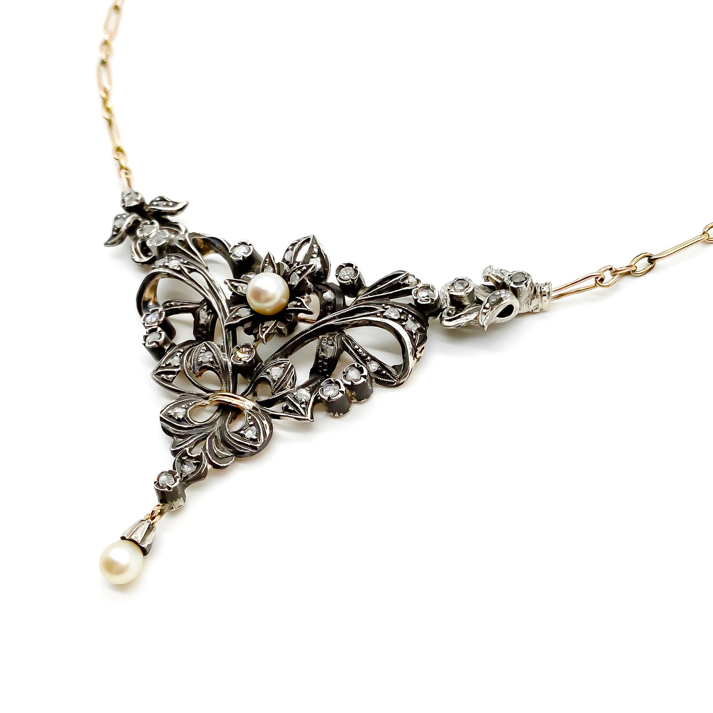 Gorgeous Edwardian gold and silver necklace set with old-cut diamonds and two pearls. Circa 1910