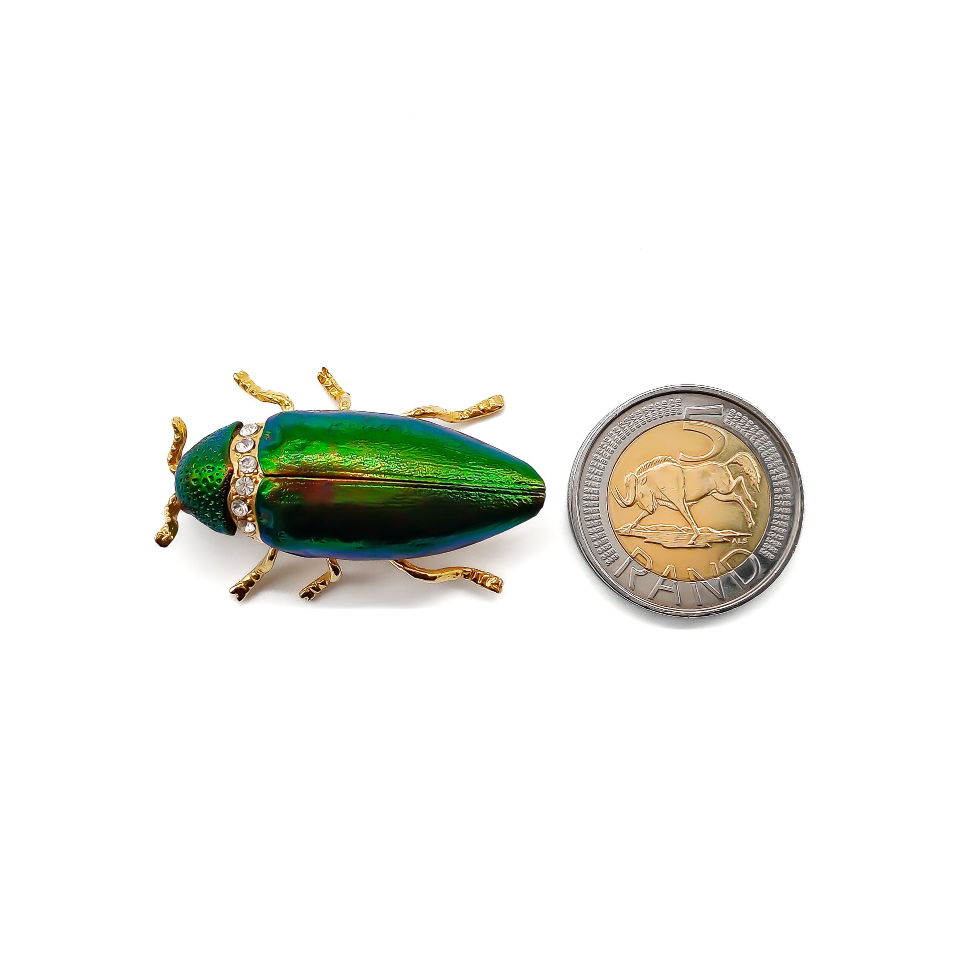 Stunning brooch made from a real iridescent green jewel beetle and added pastes in a gilt setting. 