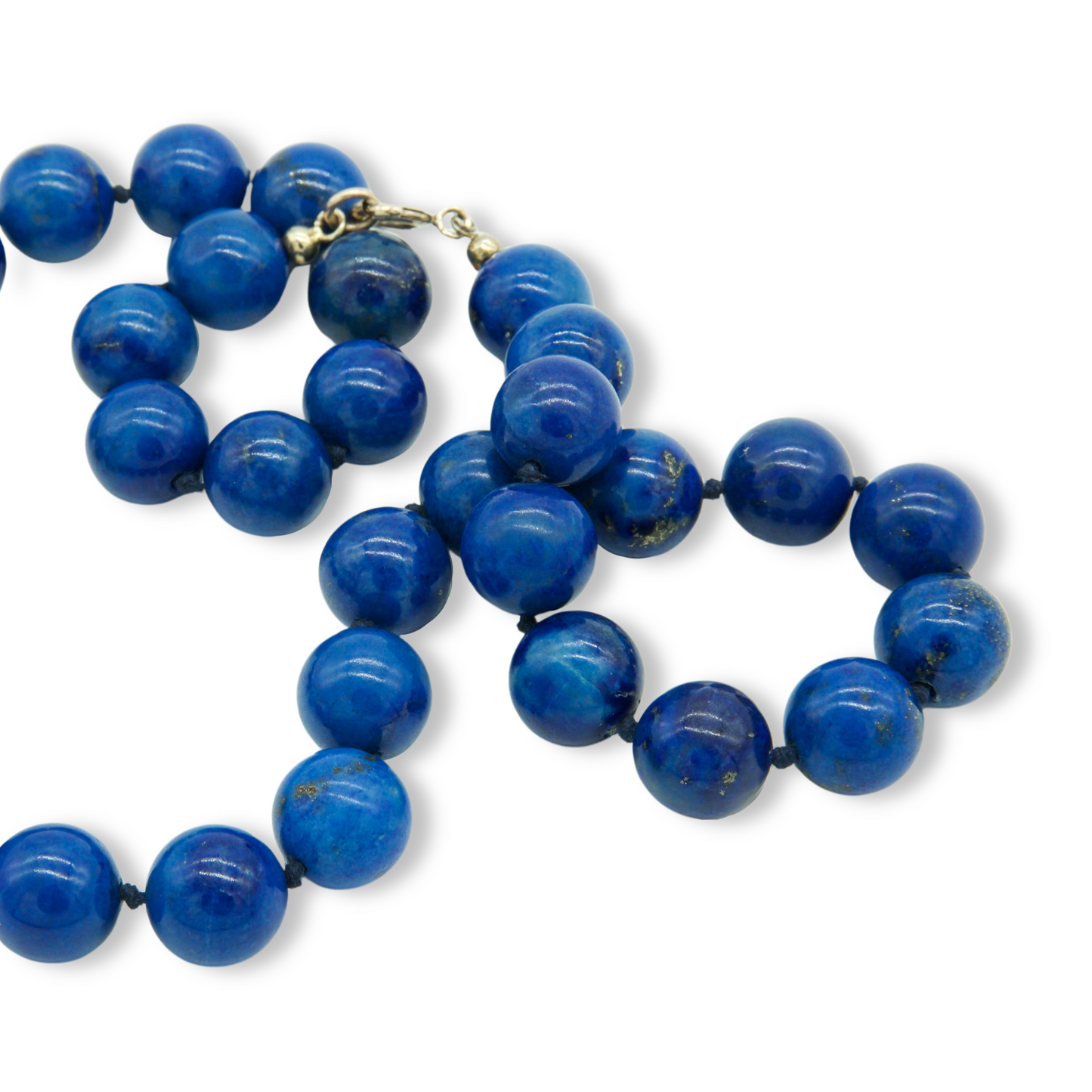 Stunning string of bright blue large, golden flecked lapis lazuli beads with a 9ct yellow gold clasp.