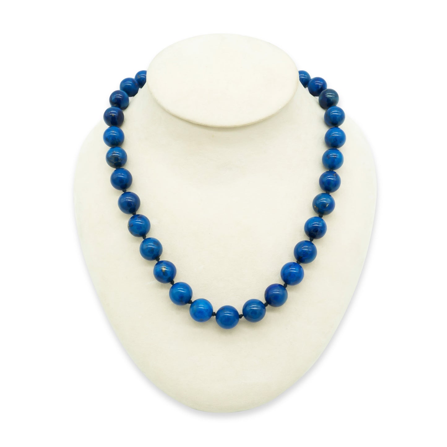 Stunning string of bright blue large, golden flecked lapis lazuli beads with a 9ct yellow gold clasp.