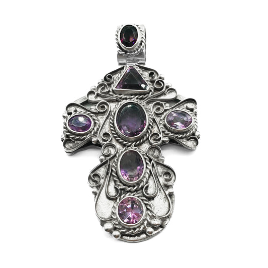 Magnificent large sterling silver Mexican cross pendant set with seven faceted amethyst stones. Circa 1940’s