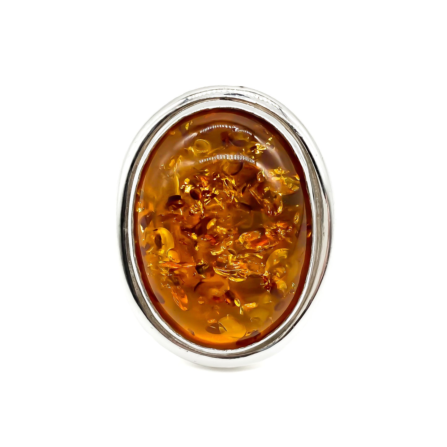 Magnificent sterling silver ring set with a large oval piece of amber.