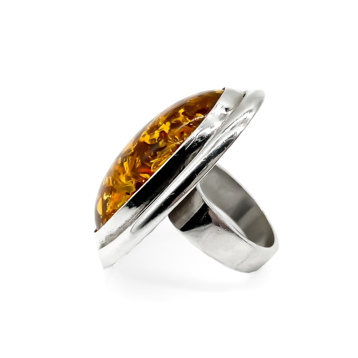 Magnificent sterling silver ring set with a large oval piece of amber.